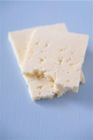 rebanar - Two slices of feta Foto de stock - Sin royalties Premium, Código: 659-07028081