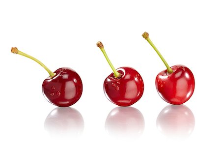stone fruit - Three Cherries Stock Photo - Premium Royalty-Free, Code: 659-07028125