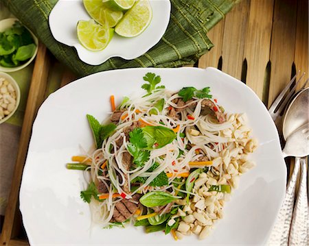 finger food people - Noodle salad with beef (Vietnam) Stock Photo - Premium Royalty-Free, Code: 659-07028222