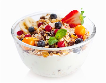 fruits and grains and white background - Fruit muesli with yoghurt in a glass bowl Stock Photo - Premium Royalty-Free, Code: 659-07028242