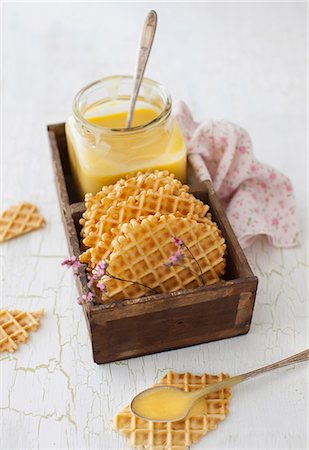 simsearch:659-07609967,k - Orange and grapefruit spread with waffles in a wooden box Stock Photo - Premium Royalty-Free, Code: 659-07028345