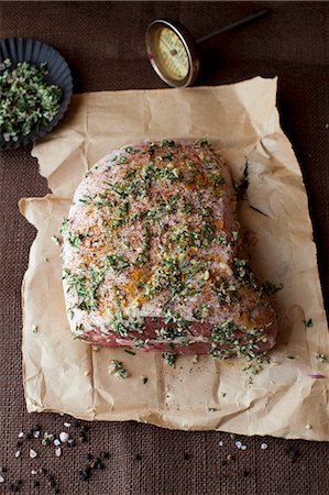 Uncooked Lamb Roast Seasoned with Herbs Stock Photo - Premium Royalty-Free, Code: 659-07028533