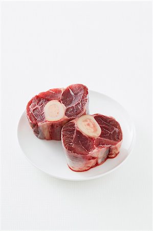 simsearch:659-01843908,k - Raw slices of beef shin for osso bucco Stock Photo - Premium Royalty-Free, Code: 659-07028602