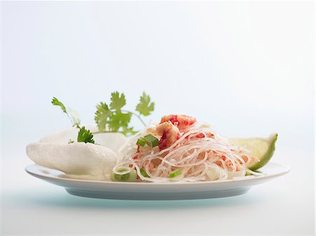 prawn finger food - Cellophane noodle salad with prawns and prawn crackers Stock Photo - Premium Royalty-Free, Code: 659-07028633