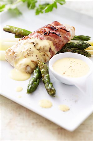 simsearch:659-01857475,k - Hake wrapped in bacon with asparagus and hollandaise sauce Stock Photo - Premium Royalty-Free, Code: 659-07028693