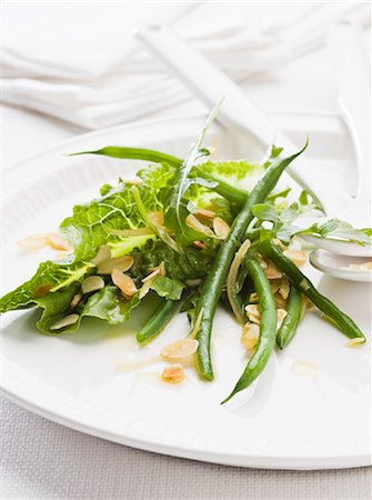 flaked almond - A salad of green beans with rocket and sliced almonds Stock Photo - Premium Royalty-Free, Code: 659-07028710