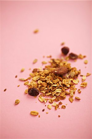 raisin - Breakfast cereal against a pink background Stock Photo - Premium Royalty-Free, Code: 659-07028766