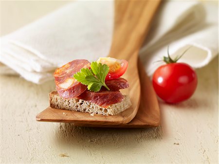 simsearch:659-06671673,k - A chorizo canapé Stock Photo - Premium Royalty-Free, Code: 659-07028761