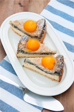 simsearch:659-07028975,k - Three slices of apricot and poppy seed cake Stock Photo - Premium Royalty-Free, Code: 659-07028887
