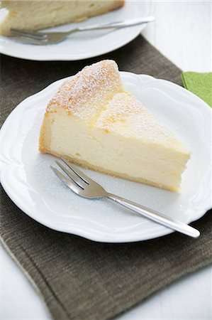 A slice of cheese cake Foto de stock - Sin royalties Premium, Código: 659-07028897