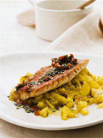 fish recipe - Red mullet with saffron potatoes and tomato & dill salsa Stock Photo - Premium Royalty-Free, Code: 659-07029053