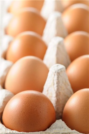 egg (food) - Brown hen's eggs in an eggbox (close-up) Stock Photo - Premium Royalty-Free, Code: 659-07068658