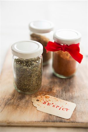 Assorted spices in screw-top jars Stock Photo - Premium Royalty-Free, Code: 659-07068707