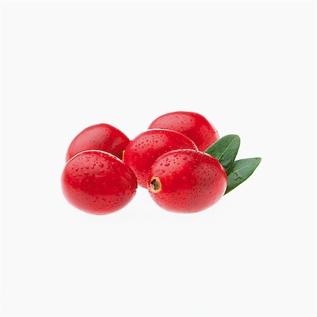 Five cranberries with water droplets Stock Photo - Premium Royalty-Free, Code: 659-07069025