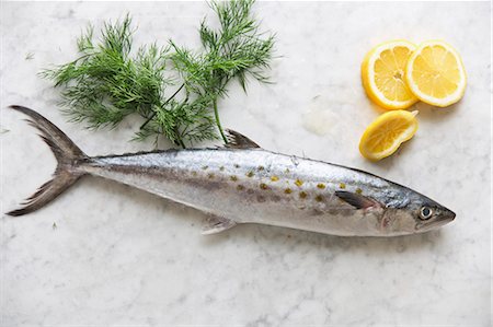 food top view - Whole Fresh Mackerel on Marble with Lemon and Dill Stock Photo - Premium Royalty-Free, Code: 659-07069132