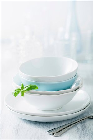 rice in plate - Stacked dinner bowls and plates, drinking glasses and forks Stock Photo - Premium Royalty-Free, Code: 659-07069252