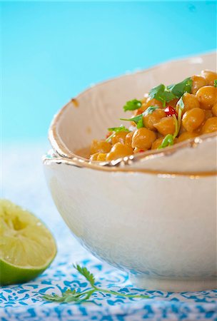 simsearch:659-07069618,k - Spicy chickpeas in coconut milk with coriander and chillies Stock Photo - Premium Royalty-Free, Code: 659-07069295