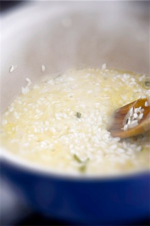 focus - Risotto rice being cooked in stock Stock Photo - Premium Royalty-Free, Code: 659-07069613