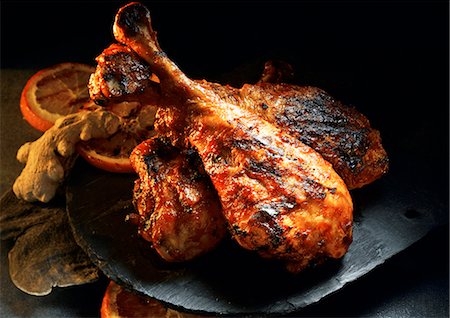 food pictures with black background images - Barbecued turkey legs with orange and ginger Stock Photo - Premium Royalty-Free, Code: 659-07069675