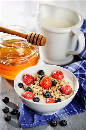 Muesli with fruits, milk and honey Stock Photo - Premium Royalty-Free, Code: 659-07069712