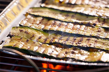 simsearch:659-07598877,k - Courgette strips in an aluminium tray on a barbecue Stock Photo - Premium Royalty-Free, Code: 659-07069807