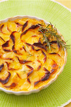 rosemary sprig - Potato gratin with rosemary Stock Photo - Premium Royalty-Free, Code: 659-07069819