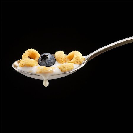 food on black - Spoonful of Cereal with Milk and a Blueberry Stock Photo - Premium Royalty-Free, Code: 659-07597013