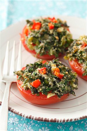 Tomatoes stuffed with herbs Foto de stock - Sin royalties Premium, Código: 659-07597154