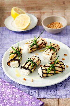 Rolled aubergine slices stuffed with feta Stock Photo - Premium Royalty-Free, Code: 659-07597158