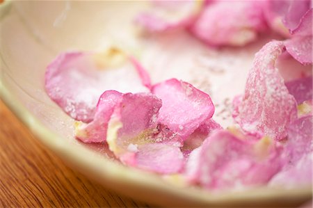 flower petals closeup - Rose petals in icing sugar Stock Photo - Premium Royalty-Free, Code: 659-07597191