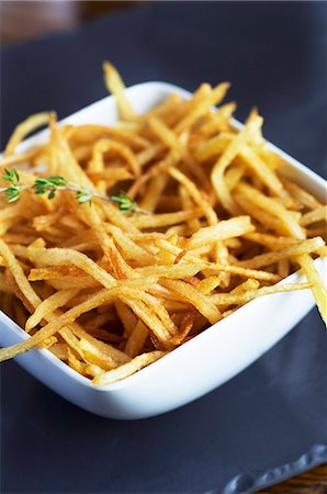 fries - Chips with thyme Stockbilder - Premium RF Lizenzfrei, Bildnummer: 659-07597555