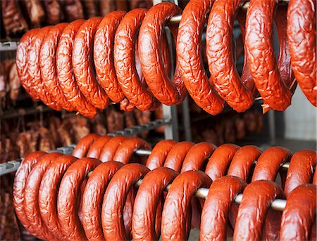 sausage still life - Sausages hanging in a smokehouse Stock Photo - Premium Royalty-Free, Code: 659-07597659