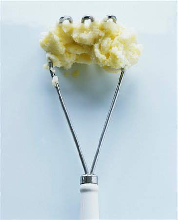 püree - A potato masher with mashed potato Stock Photo - Premium Royalty-Free, Code: 659-07597777