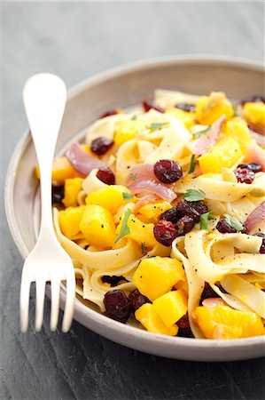 simsearch:659-07597829,k - Tagliatelle with squash, cranberries and parsley Stock Photo - Premium Royalty-Free, Code: 659-07597836