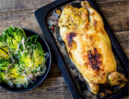 poule - 37. Whole roast chicken stuffed with salad Photographie de stock - Premium Libres de Droits, Code: 659-07597905