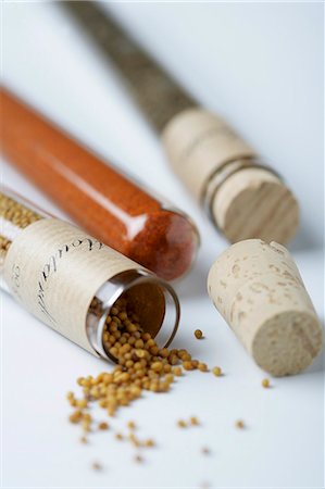 spice still life - Test tubes with assorted spices (sweet paprika, mint and mustard seeds) Stock Photo - Premium Royalty-Free, Code: 659-07598018
