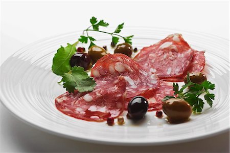 salami slice - Salami paesano Stock Photo - Premium Royalty-Free, Code: 659-07598397