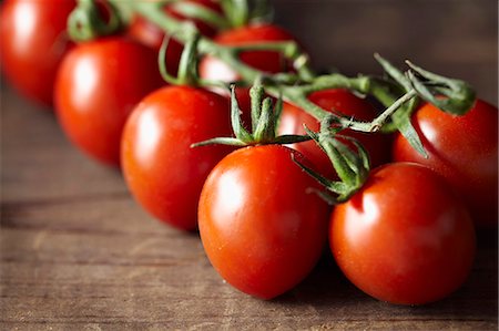 Vine tomatoes (close-up) Stock Photo - Premium Royalty-Free, Code: 659-07598421
