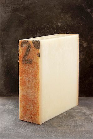 stucco - A piece of Gruyère cheese Stock Photo - Premium Royalty-Free, Code: 659-07598490