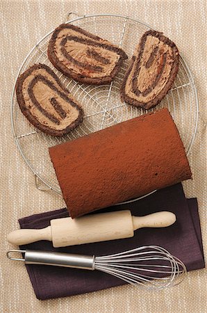 simsearch:659-06901711,k - A chocolate Swiss roll Stock Photo - Premium Royalty-Free, Code: 659-07598706