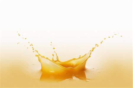 Orange juice with splash Photographie de stock - Premium Libres de Droits, Code: 659-07598908