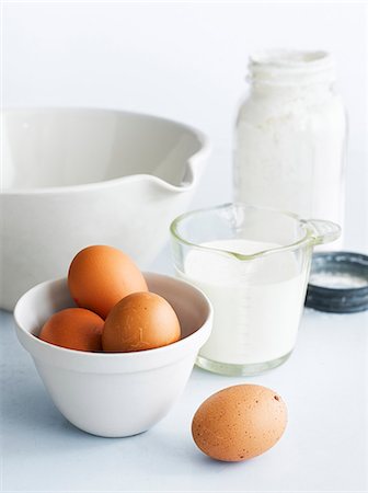 simsearch:659-06307365,k - Assorted baking ingredients: eggs, milk, a mixing bowl Stock Photo - Premium Royalty-Free, Code: 659-07598900