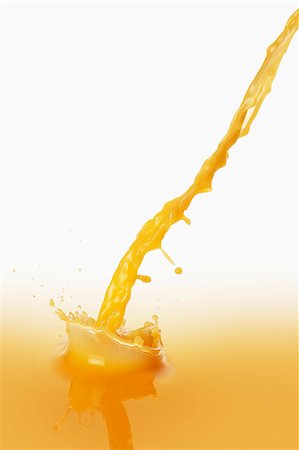 Juice splashing Photographie de stock - Premium Libres de Droits, Code: 659-07599139