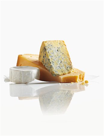 simsearch:659-01860103,k - Three Assorted Cheeses on a White Background Photographie de stock - Premium Libres de Droits, Code: 659-07599144