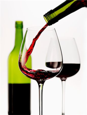 Red wine being poured into a glass Foto de stock - Sin royalties Premium, Código: 659-07599265