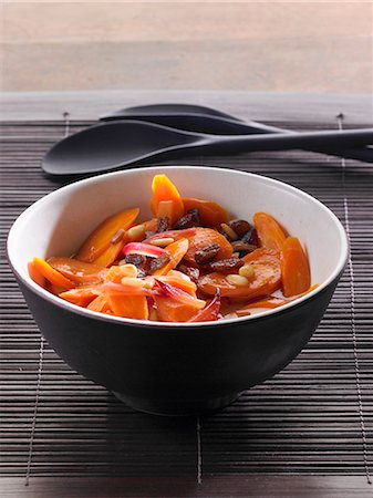 Carrot salad with pine nuts, red onions and raisins Stock Photo - Premium Royalty-Free, Code: 659-07599291