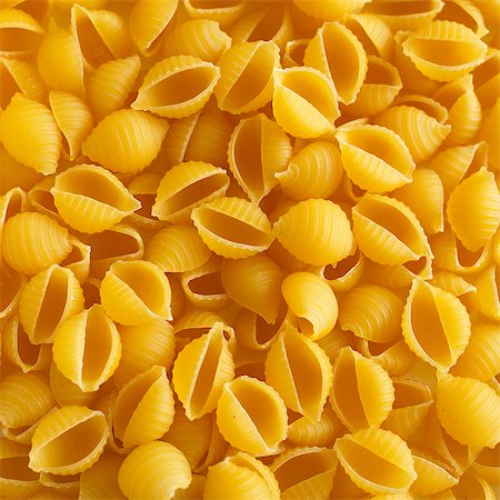 simsearch:649-06717144,k - Pasta shells (filling the image) Photographie de stock - Premium Libres de Droits, Code: 659-07599351