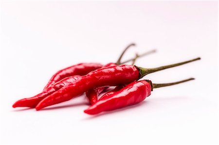 simsearch:659-06154321,k - Fresh red chillies Photographie de stock - Premium Libres de Droits, Code: 659-07609576