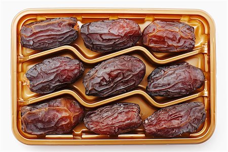 Dried Medjool dates in plastic packaging Foto de stock - Sin royalties Premium, Código: 659-07609573