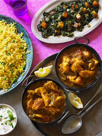 simsearch:659-07069872,k - Chicken Balti (chicken curry, India) with spinach and saffron rice Stock Photo - Premium Royalty-Free, Code: 659-07609663